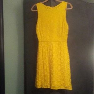 Bright yellow slip dress with lace overlay